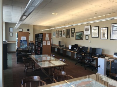 Michigan Room with tables, bookshelves and public computers